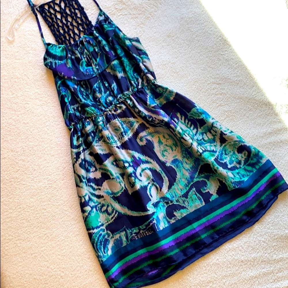 A spaghetti strapped, light, & silk dress